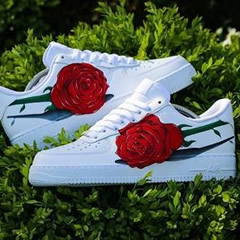 white trainers with red roses
